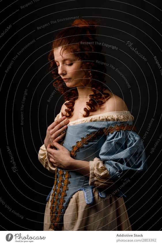 Beautiful woman in medieval clothing Woman Baroque Dress Red-haired Carnival Renaissance Princess Royal masquerade Fantasy Clothing aristocrat Fashion Elegant