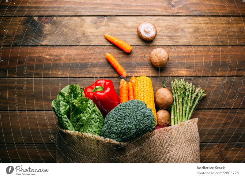 Linen sack with assorted vegetables on table Vegetable Bag Table assortment Fresh Food Healthy Organic Vegan diet Kitchen Sack Lettuce Broccoli Shopping