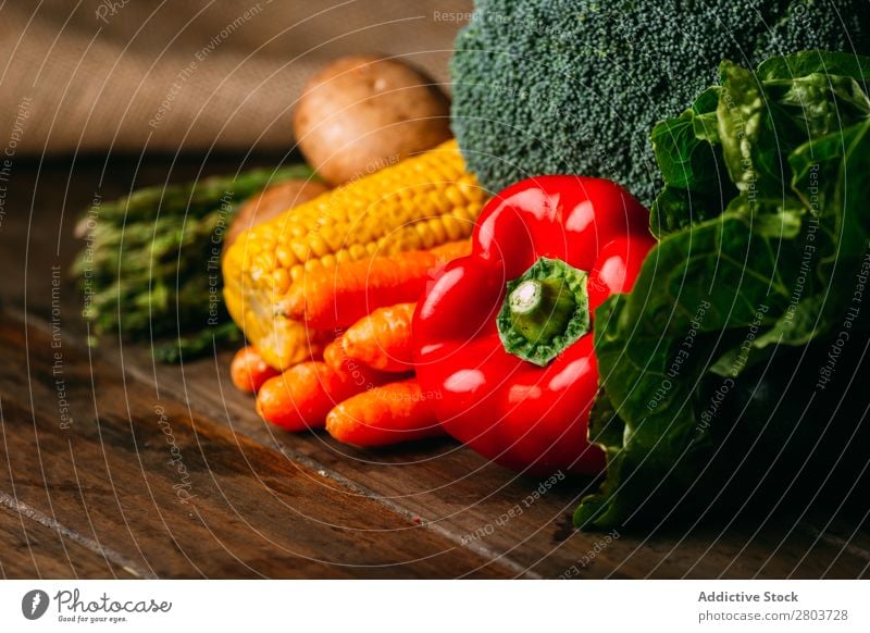 Vegetables and utensils on kitchen table Cooking Table Linen assortment Fresh Food Healthy Organic Vegan diet Knives Chopping board Kitchen Lettuce Broccoli