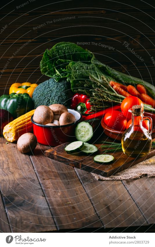 Vegetables and utensils on kitchen table Cooking Table Linen assortment Fresh Food Healthy Organic Vegan diet Knives Chopping board Kitchen Lettuce Broccoli