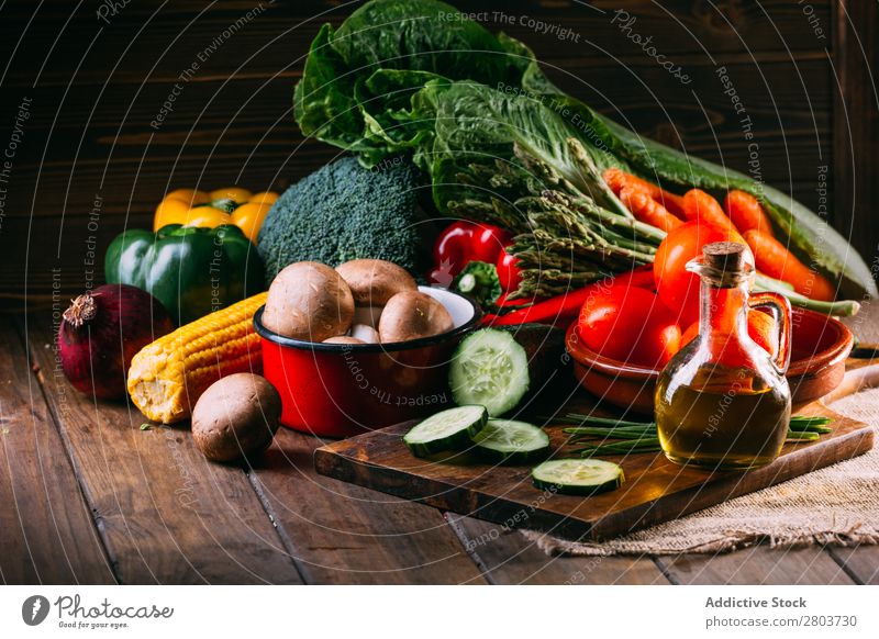 Vegetables and utensils on kitchen table Cooking Table Linen assortment Fresh Food Healthy Organic Vegan diet Knives Chopping board Kitchen Lettuce Broccoli