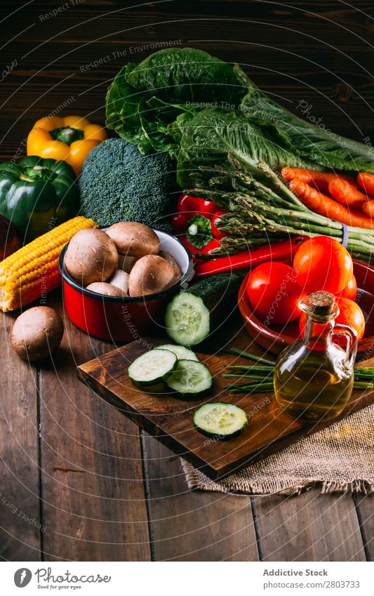 Vegetables and utensils on kitchen table Cooking Table Linen assortment Fresh Food Healthy Organic Vegan diet Knives Chopping board Kitchen Lettuce Broccoli