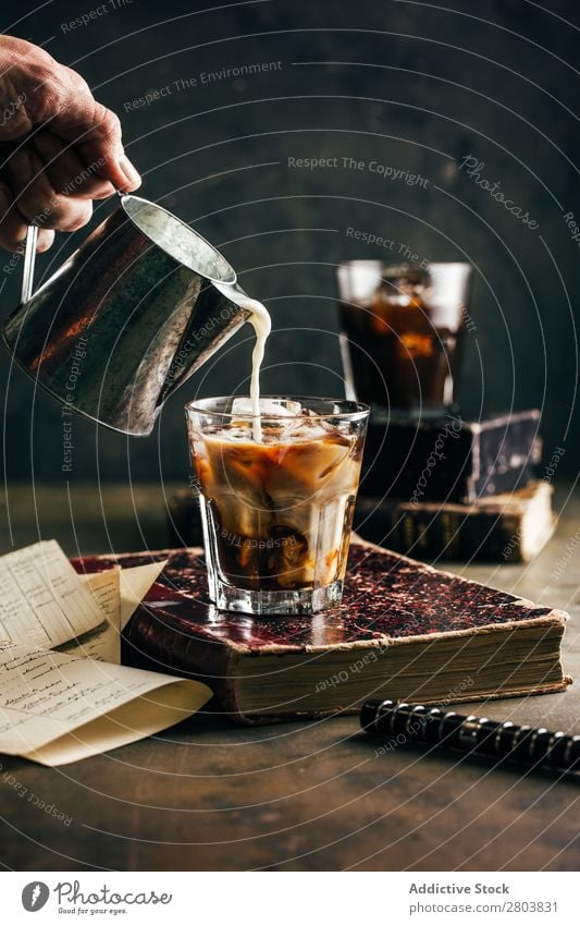 Pouring milk in a cold espresso coffee glass Antique Aromatic Beans Beverage Book Breakfast brew Brown Caffeine Coffee Coffee break Coffee pot Cream Cup