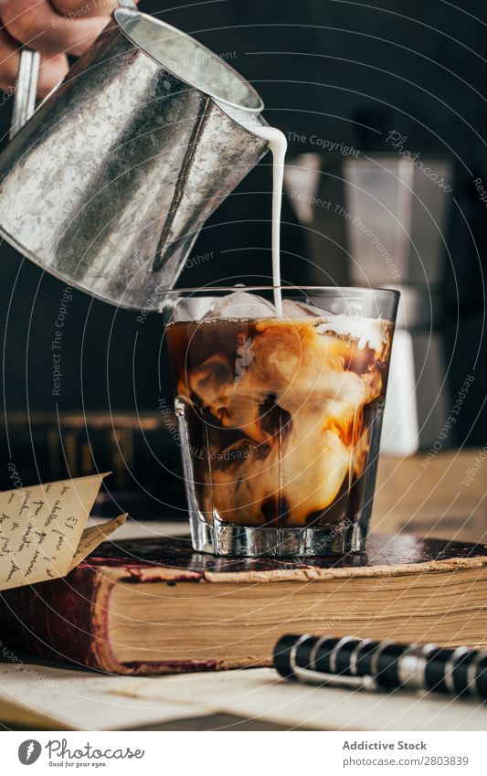 Pouring milk in a cold espresso coffee glass Antique Aromatic Beans Beverage Book Breakfast brew Brown Caffeine Coffee Coffee break Coffee pot Cream Cup