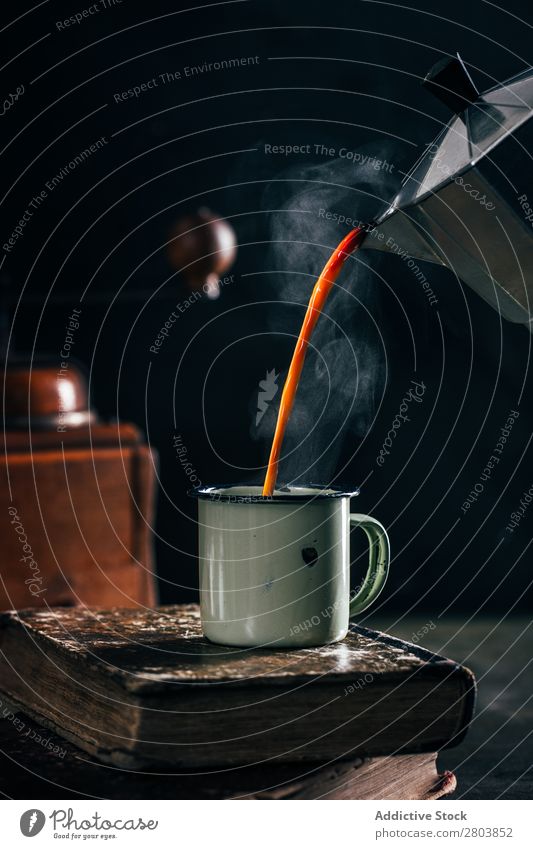 Poring hot coffee in an enamel cup Antique Aromatic Beans Beverage Black Book Breakfast Caffeine Coffee Coffee break Coffee pot Cream Cup Drinking Enamel