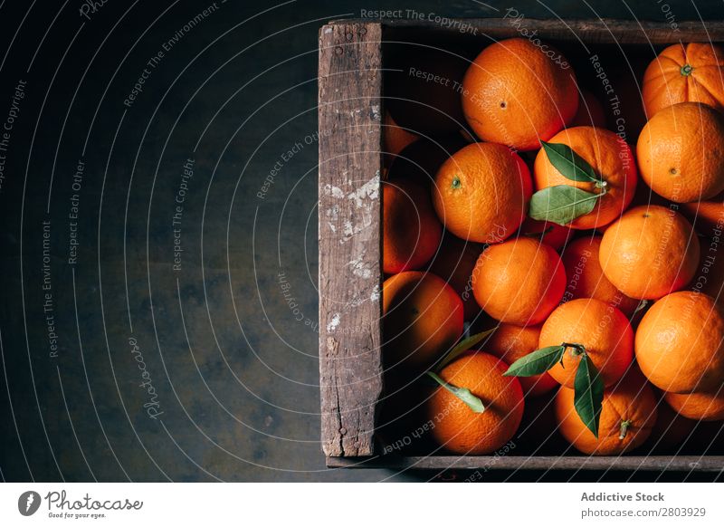 Fresh oranges in an old wooden box Breakfast citrus Delicious Drinking Fruit Healthy Juice Orange Organic Tasty Vitamin Wooden box Refreshment Sweet