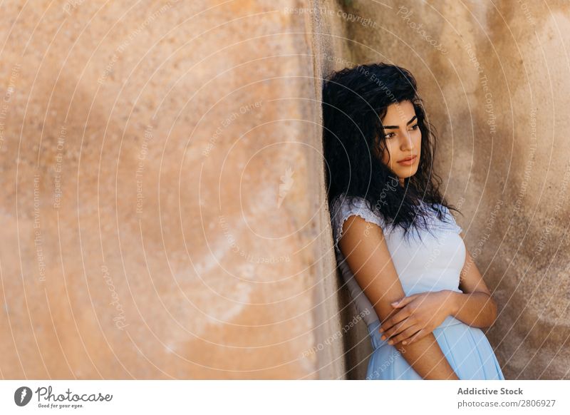 Beautiful ethnic woman near shabby wall Woman Moroccan Wall (building) grungy Ethnic Elegant Lean Exterior Building Youth (Young adults) Model Thin Shabby Dirty