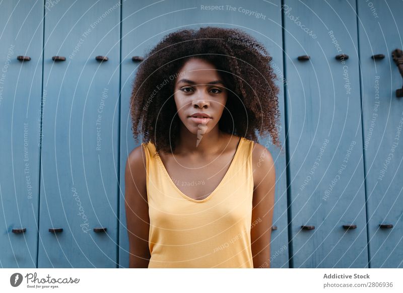 Gorgeous black woman in dress on street Woman Door Black Dress Curly Town To enjoy Blue Barefoot Ethnic African-American Afro Beautiful tender Body