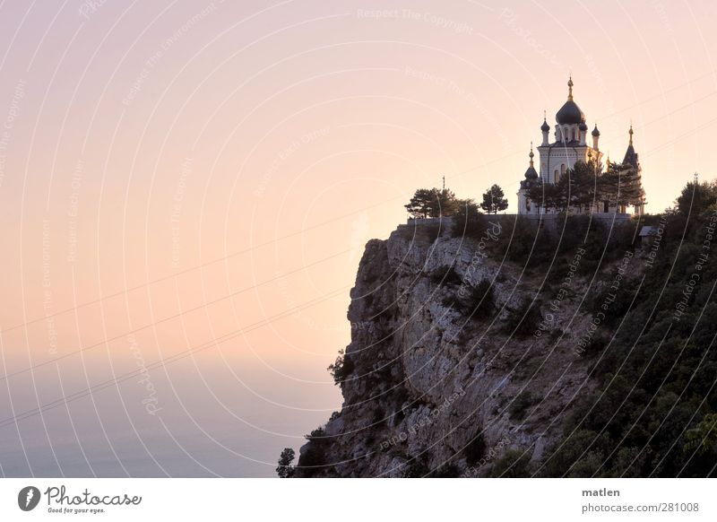 the energetically soft light Sky Cloudless sky Horizon Sunrise Sunset Beautiful weather Rock Coast Deserted Church Belief Humble High voltage power line Cliff