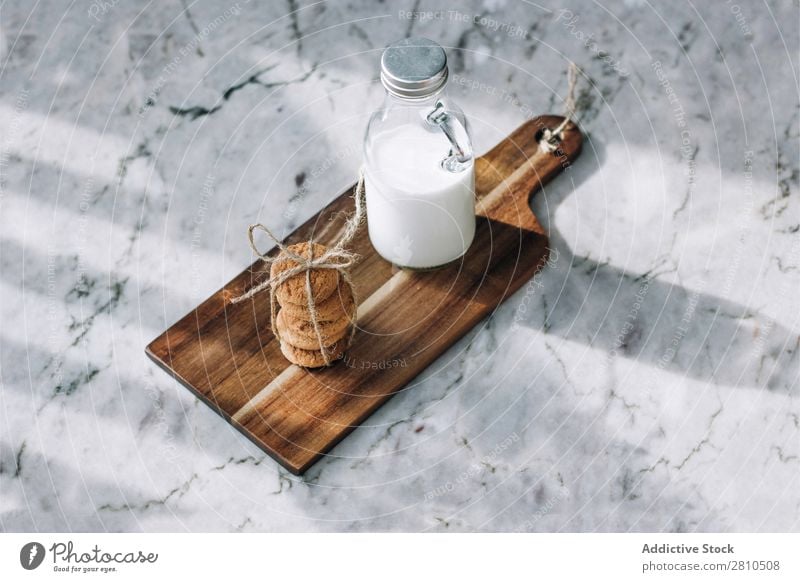 Bottle of milk and cookies Milk Cookie Sweet Glass Food Table Snack Dessert White Fresh Drinking Delicious To feed Kitchen Stack Breakfast Sugar Home Tasty