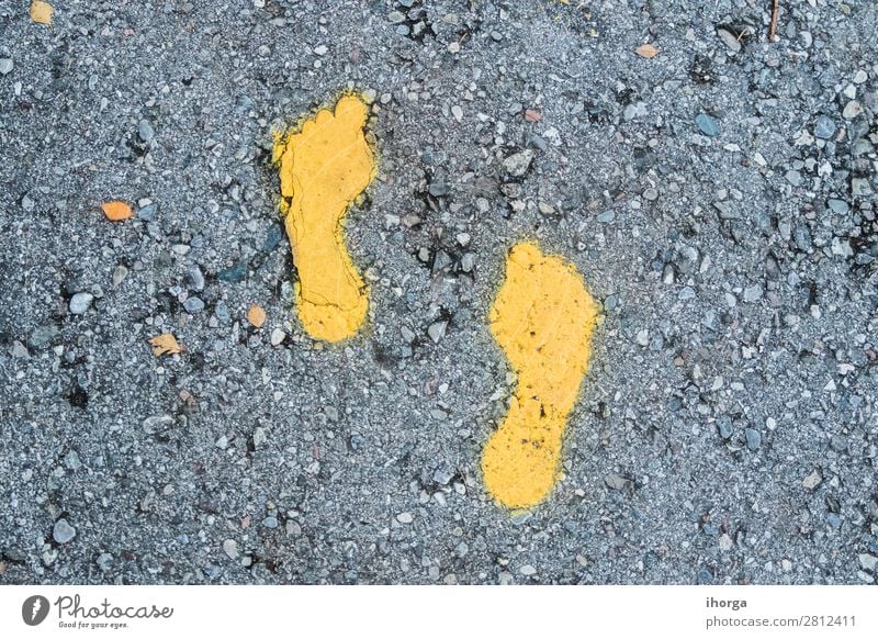 Yellow footprint signs on the floor for pedestrian Lifestyle Leisure and hobbies Vacation & Travel Trip Adventure Feet Nature Park Pedestrian Street