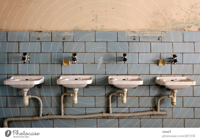 here: is room for four. Interior design Bathroom Wall (barrier) Wall (building) Concrete Line Stripe Old Authentic Cliche Orderliness Sadness Longing