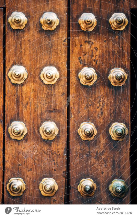 Antique Wooden Door with metal decoration. Texture background Zanzibar Old Indian Design Classic Background picture Rustic oriental Moslem doorway Exterior shot