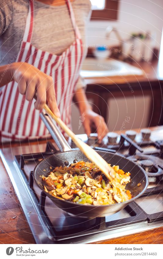 Young couple cooking. Man and woman in their kitchen Cooking Kitchen Home Dinner Youth (Young adults) Eating Wife Adults Smiling Interior design Husband Salad