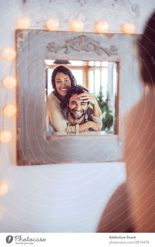 Young couple playing in front of a mirror Youth (Young adults) Playing Cute Fashion girlfriend Love Man Street Smiling Green piggyback Yellow dating Adults