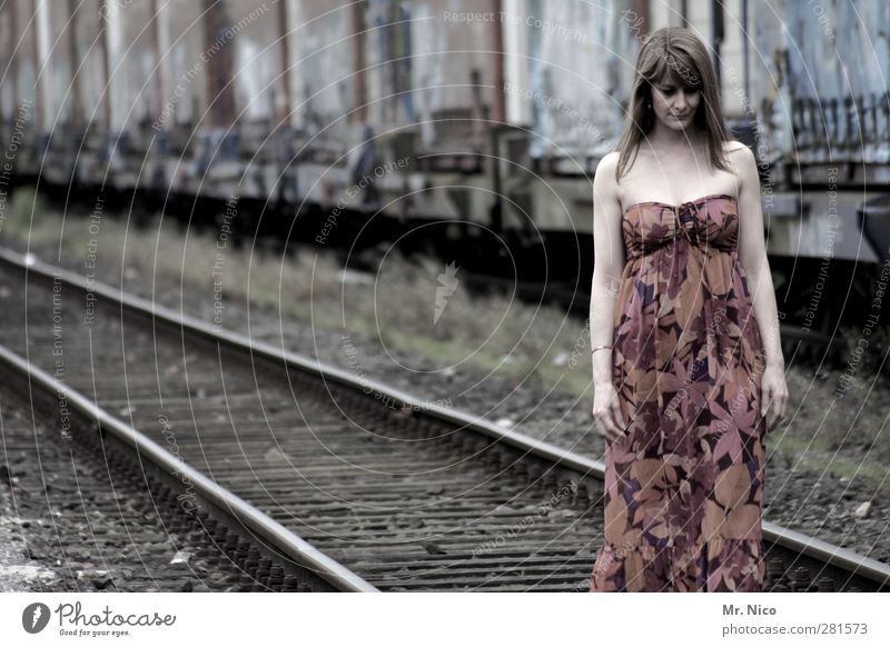 Walk The Line Feminine Skin Industrial plant Train station Logistics Rail transport Freight train Railroad tracks Dress Brunette Long-haired Think Sadness