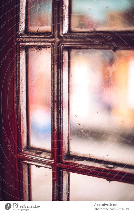 Phone booth interior phone booth Glass Interior design Telephone Vacation & Travel indoor Telecommunications Consistency Conceptual design Red Soft focus