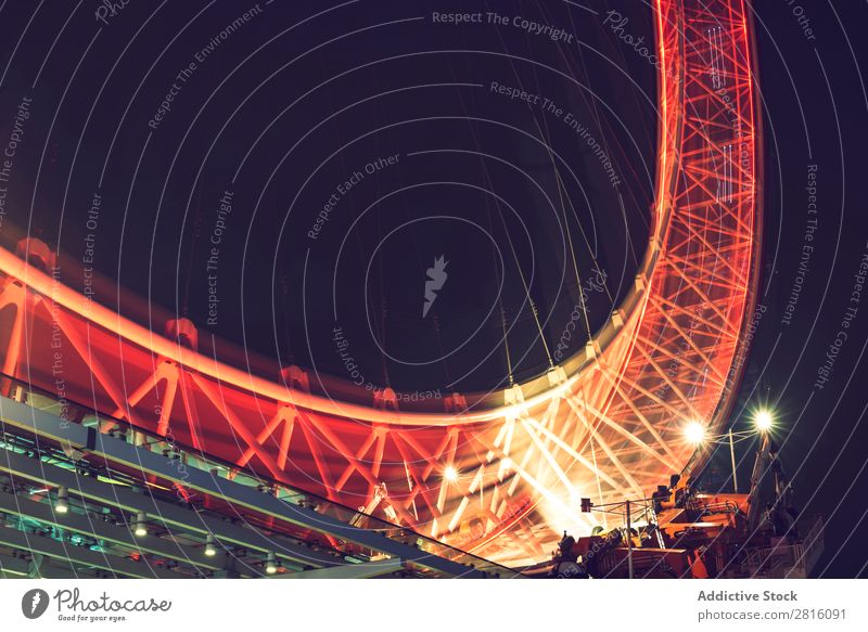 LONDON, UK - OCTOBER 13, 2016: Night shot of the London Eye in London. The London Eye is a giant Ferris wheel situated on the banks of the River Thames.