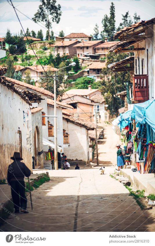 HUARAZ, PERU, JAN 10, 2016: Small village in Huaraz with Native Indian people. Peru 2016 america andean Authentic Baby cultural Culture Dress Ethnic Farm Farmer