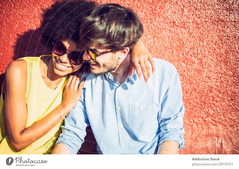 Interracial couple having fun on the rooftop Ethnic Youth (Young adults) Racing sports Caucasian Exterior shot Park African-American Boy (child) interracial