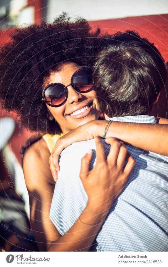 Interracial couple having fun on the rooftop Ethnic Youth (Young adults) Racing sports Caucasian Exterior shot Park African-American Boy (child) interracial