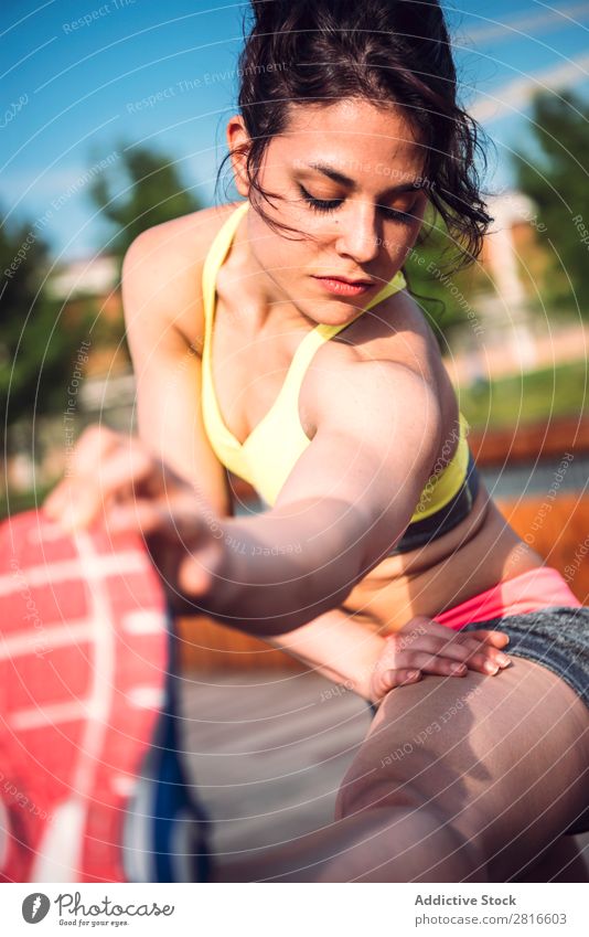 Woman warming up before outdoor workout stretch Runner Light Sports Preparation copy Practice Sit Day Bright Sunbeam Jogger Copy Space Summer Morning Fitness