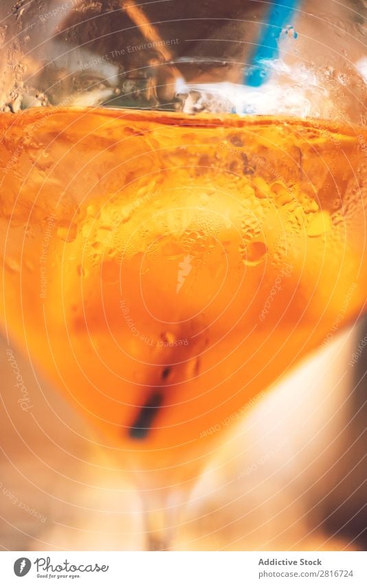 Orange color drinking and ice in the glass cup Top Vantage point Glass Water Cup Drinking Ice soda Wood Food Close-up Solid Cold Meal Table Liquid Order Thirsty