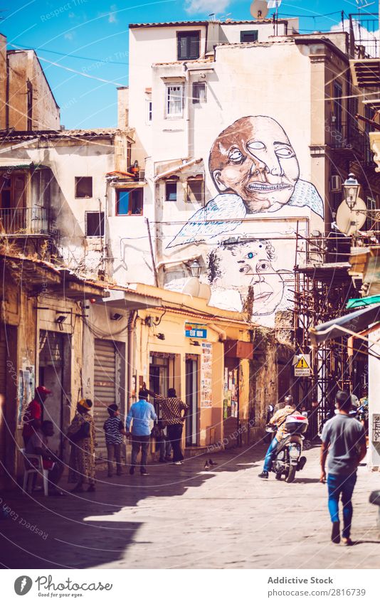 PALERMO, ITALY - JULY 17, 2016: people doing normal life in a poor neighborhood, on July 17, 2016 in Palermo, Sicily, Italy Ancient Architecture Vientiane City