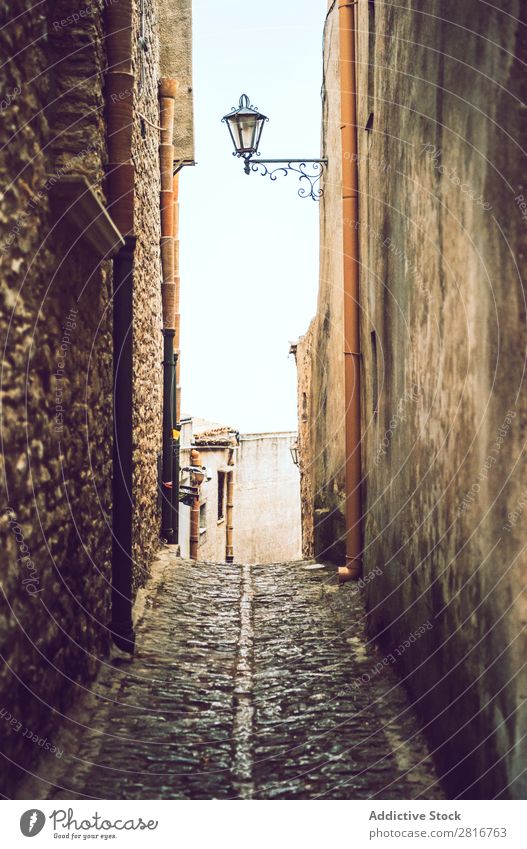 The town of Erice, Sicily, Italy, on a foggy day. Detail view Street Fog Cold streetlight Mediterranean Pavement medieval erice Loneliness Ancient Italian Stone