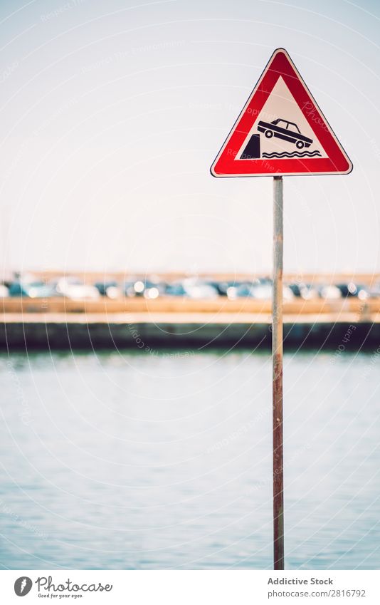 Danger Traffic siign. Risk of falling into water in a harbor sciacca Italian Agrigento Italy Day Car vehicule Multicoloured House (Residential Structure)