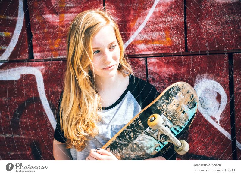 Cool skateboard woman at a public graffiti park Girl Skateboard Street Ice-skating Graffiti Woman Hat Cool (slang) Exterior shot Human being Leisure and hobbies