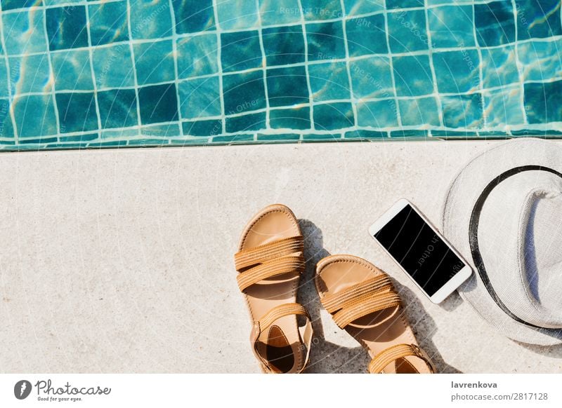 flat lay with sandals, hat and smartphone in front of the pool Background picture Blue Hat Vacation & Travel Hot Leisure and hobbies Deserted Swimming pool