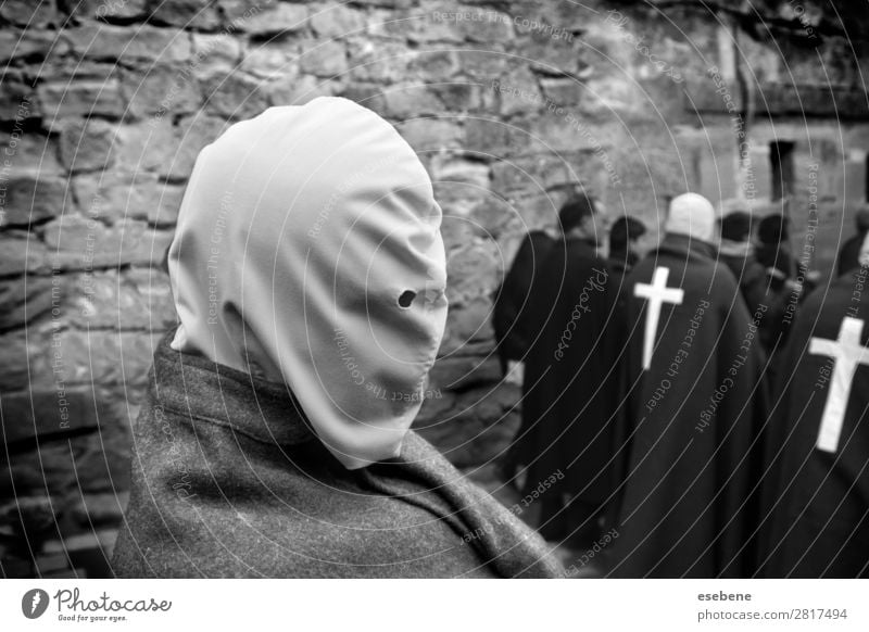 Holy Week in Spain Lifestyle Emotions Happy Religion and faith Christianity flagellation man Street life Black & white photo Exterior shot Morning