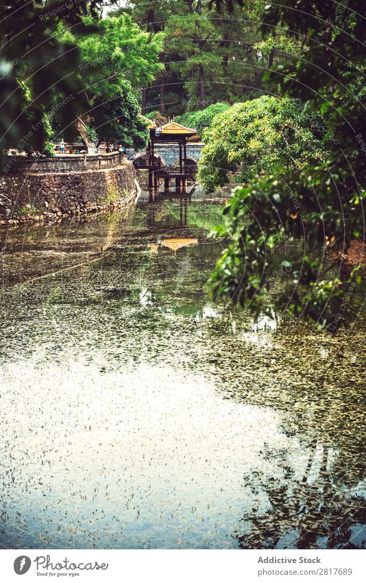 Tomb of Tu Duc emperor in Hue, in a rainy day, Vietnam - A UNESC an Ancient Architecture Asia asian Attraction Building burial Carving Complex cultural Culture