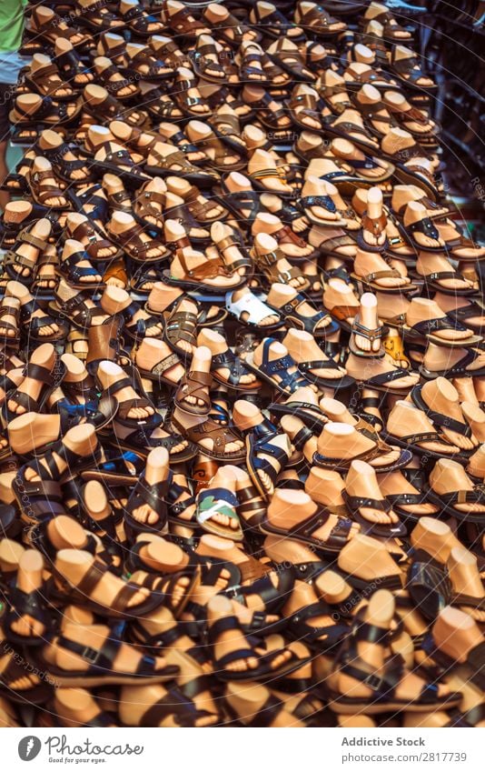 Hundreds of sandals in a market in Hanoi, Vietnam belongings brand bussiness buy Cheap Chinese Multicoloured Colour Display displaying eastern fake