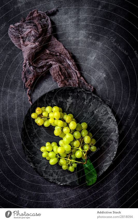 Fresh grapes on dark table Bunch of grapes Fruit Food Background picture Diet Green Healthy Natural Organic Raw Agriculture Mature Table Bird's-eye view