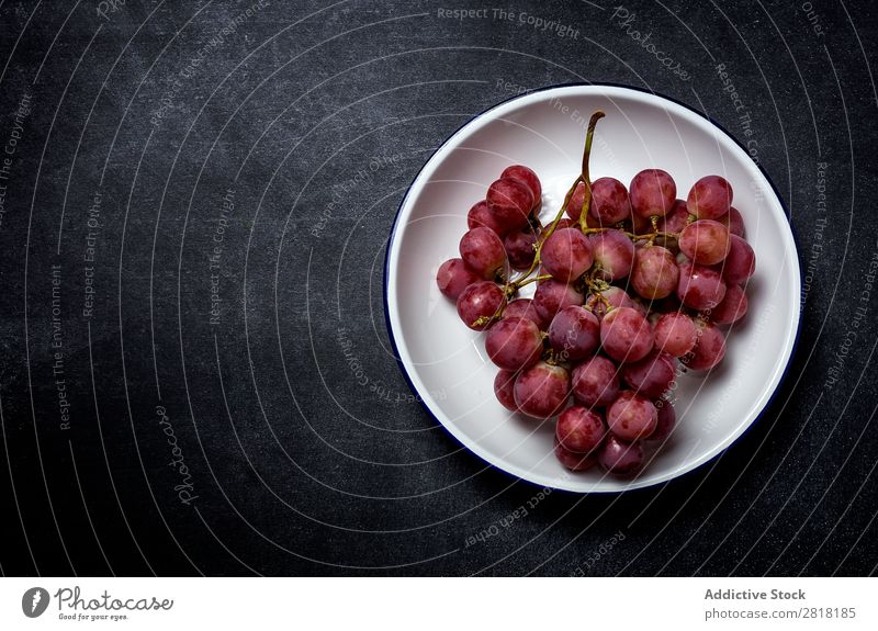 Grapes bunch on plate Bunch of grapes Mature Plate Fruit Fresh Healthy Food Sweet Berries Nature Dessert Nutrition Branch Juicy Purple Harvest Red Natural