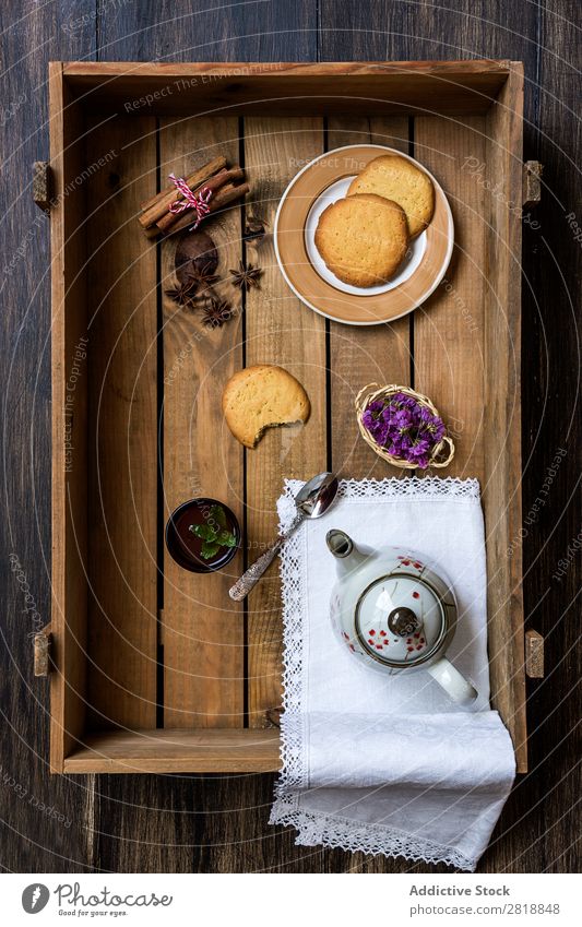 Teapot with cup of green tea with mint Mint Cinnamon Bird's-eye view Napkin Drinking Hot Food biscuits delicious Healthy Natural Wood Wooden box Close-up