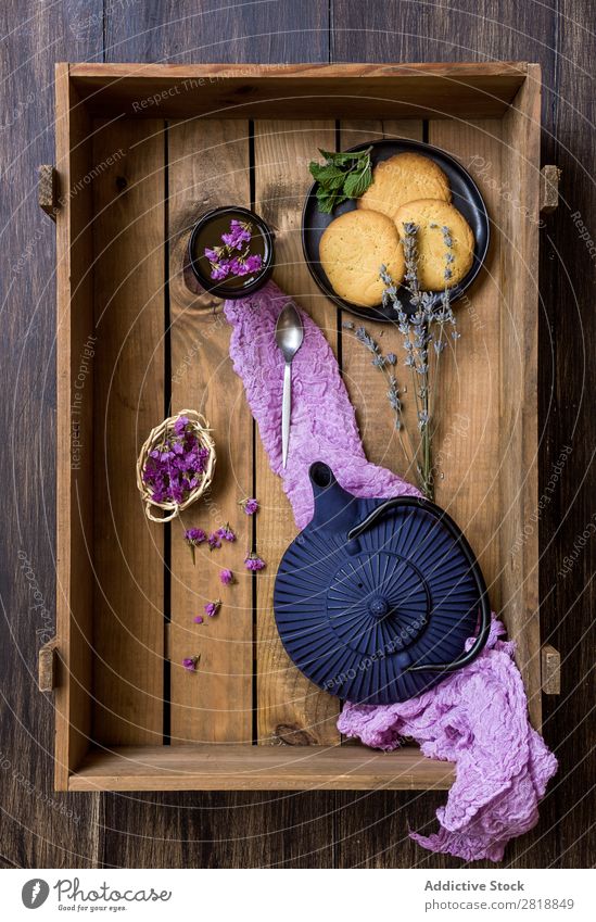 Teapot with cup of green tea with mint Mint Cinnamon Bird's-eye view Napkin Drinking Hot Food biscuits delicious Healthy Natural Wood Wooden box Close-up