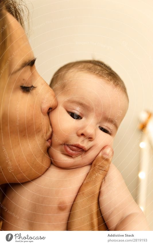 mom´s kiss Baby Child Boy (child) mum Mother Jacket Grandmother Nice Cool (slang) Cute pretty Beauty Photography Small Eyes Smiling Human being Hand Ring