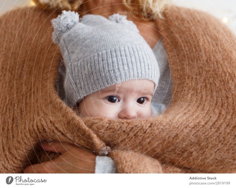 baby inside the jacket Baby Child Boy (child) mum Mother Jacket Grandmother Nice Cool (slang) Cute pretty Beauty Photography Small Eyes Smiling Human being Hand