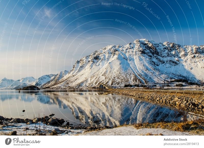 Eva Ozkoidi_Breathtaking view of the lofoen,Norway Fjord Lake lofoten Ice artic Street Coast Rock Ocean Vacation & Travel awesome Idyll Water red cabin