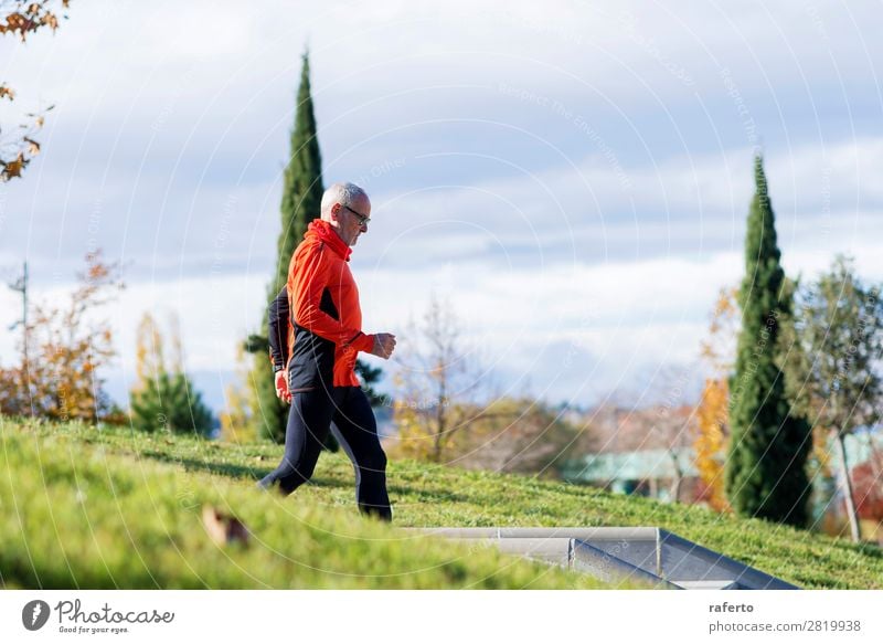 Side view of one senior caucasian athlete man training Lifestyle Relaxation Leisure and hobbies Sports Climbing Mountaineering Jogging Human being Masculine Man