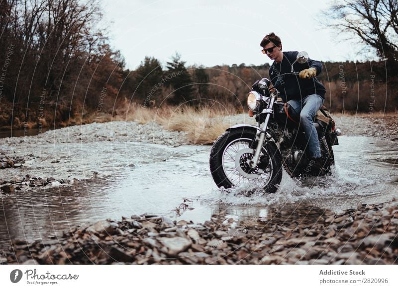 Motorcyclist riding in rocks Man Landscape Stream Brook Vacation & Travel Macho Transport Freedom Adventure Rider Tourist Style Nature Driving Motorcycling