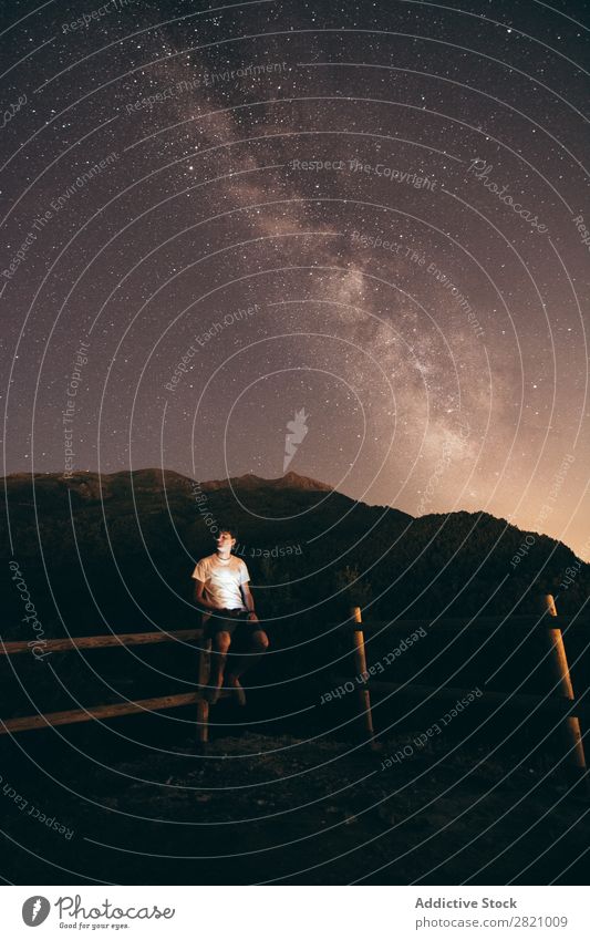 Man sitting on fence at night Night Stars Fence Wood Sit Sky Universe Light Galaxy Landscape Dark Silhouette Cosmos Astronomy Nature starry Fantasy milky way