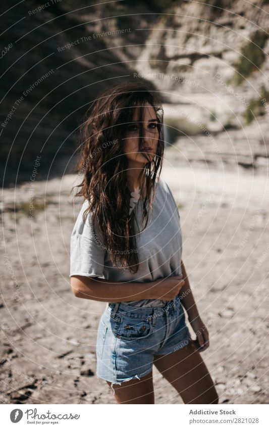 Young woman standing at cliff Woman Cliff Nature pretty Looking into the camera Stand Youth (Young adults) Beautiful Girl Summer Sunbeam Lifestyle Attractive