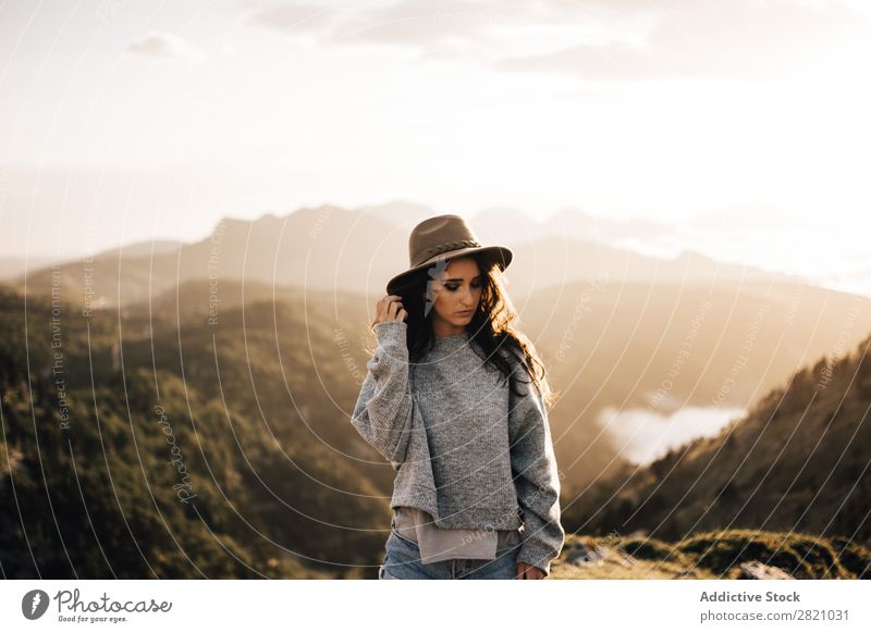 Woman standing in mountains Stand Hat Valley Posture romantic Mountain Vacation & Travel Top Rock Freedom Youth (Young adults) Nature Tourist Peak Adventure