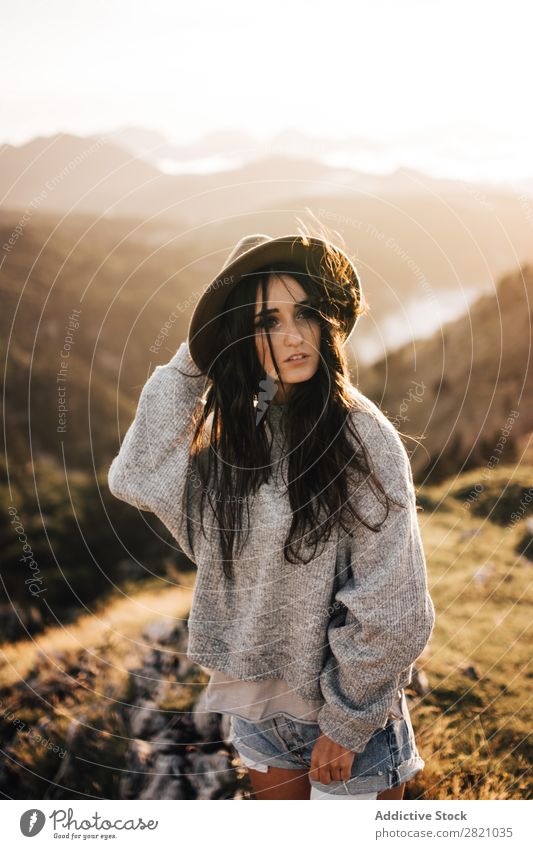 Woman standing in mountains Stand Hat Valley Posture romantic Mountain Vacation & Travel Top Rock Freedom Youth (Young adults) Nature Tourist Peak Adventure