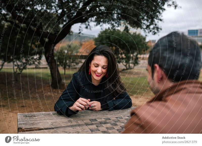 Couple at wooden table in park Sit Park Adults Love Human being Woman Man 2 Nature Happy Portrait photograph Beautiful Lifestyle Together Exterior shot romantic