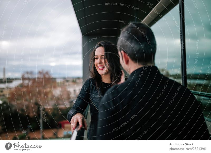 Adult couple standing on balcony Couple Adults Stand Balcony Woman Man Together Love Cheerful Flirt Lifestyle Romance Human being Beautiful romantic 2 Happy